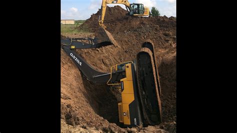 dig big hole hogs fall in with mini excavator|mini ex digging hole.